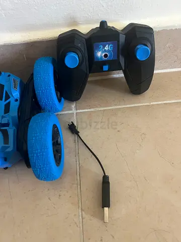 Remote control stunt car with USB charger (blue) - used, working
