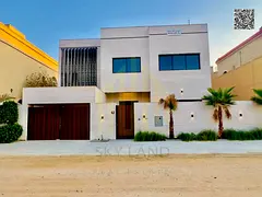 A stunning villa with a swimming pool, comprising 5 master bedrooms with built-in wardrobes and a ro