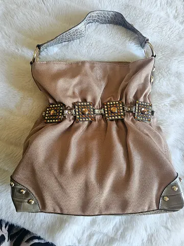 Breand new bag with stone work on it