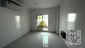 For annual rent: A very spacious two-bedroom apartment with a living room in Al Rawda 2, Ajman. Exce