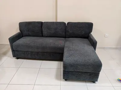 Grey L-shaped fabric sofa with chaise - good condition