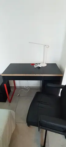 Compact black study desk with LED lamp and office chair