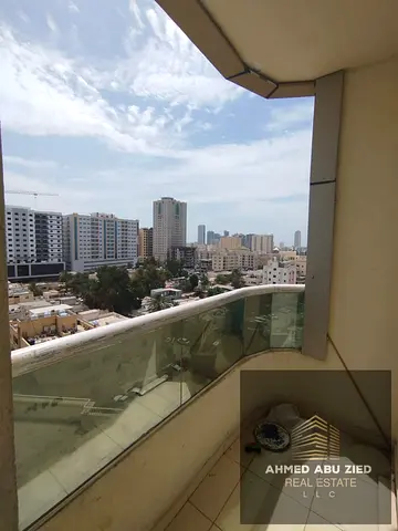 Two-bedroom apartment for annual rent in Ajman, Orient Towers. Features include a swimming pool, gym, parking, and proximity to all services