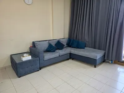 L Shaped Sofa with coffee table.