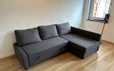 Grey L-shaped Sofa Bed with Storage — Good Condition