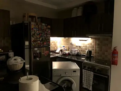 Front-load washing machine, fridge/freezer/stove, microwave are  in good working condition (used)