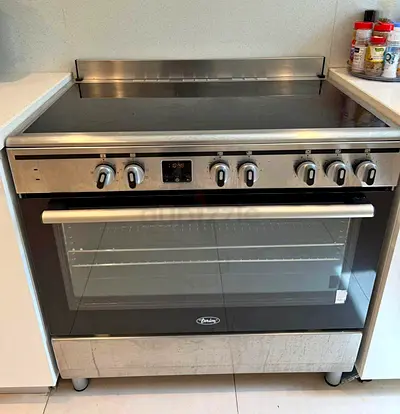 Stainless Steel Electric Range with Glass-Top and Oven - Good Condition
