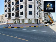 A six-story residential and commercial building (ground + 6 floors) (on the corner of two streets) i