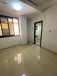 First occupancy studio apartment for annual rent in Al Muwaihat 3, central air conditioning and gas,