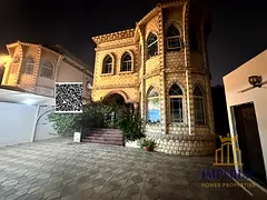5-bedroom villa with a 15-year-old pool for sale in Al Rawda 1, on a 4,400-square-foot lot, freehold