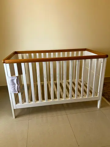 White Wooden Baby/toddler Cot / Crib with Natural Wood Trim - Good Condition