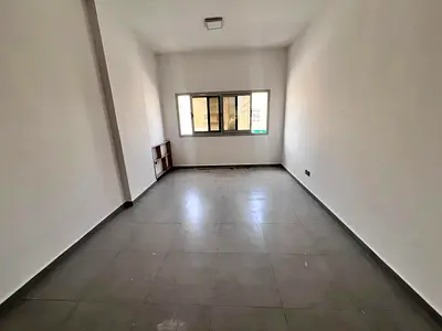 Experience tranquility and sophistication in a spacious studio in Rawda 1, close to Dubai and Sharjah, within a clean building in a prime location wit