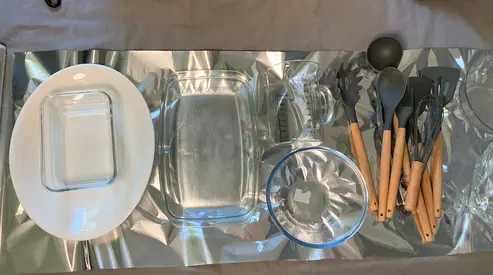 Lot of kitchen bakeware, serving dishes and utensils - good condition