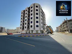 A six-story residential and commercial building (ground + 6 floors) (on the corner of two streets) i