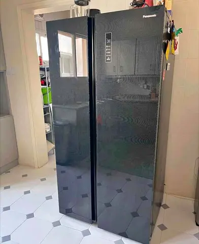 Panasonic side by side fridge freezer same like new condition perfect working