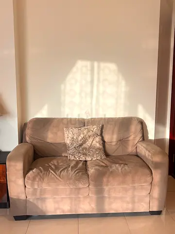 2-seater beige suede sofa in good condition (IMMEDIATE SALE!!! - leaving the country)(Negotiable)