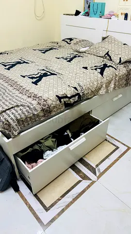 White Storage Bed with four Large Drawers and shelfs two sides. Also can bend forward on head sectio