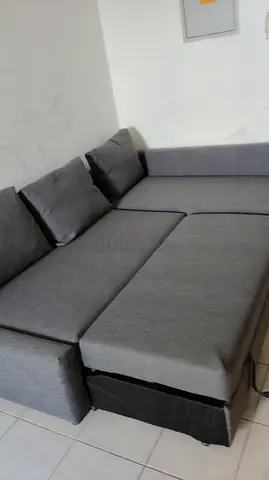 Grey L-shaped Sofa Bed with Storage - Good Condition
