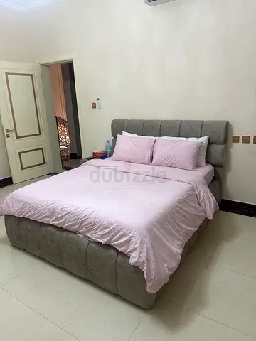 Queen-size upholstered platform bed with Mattress — beige fabric