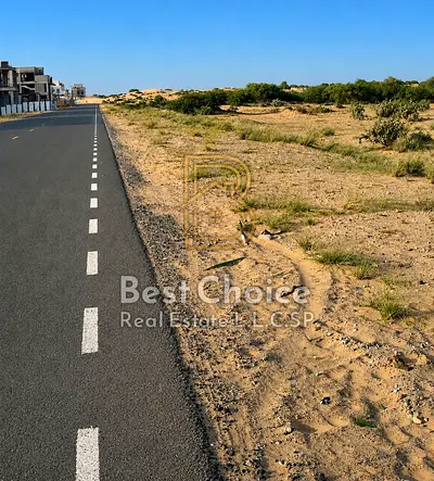 أرض زاوية على شارع 24 بالأقساط للبيع في حي حوشي – الطرح الجديد