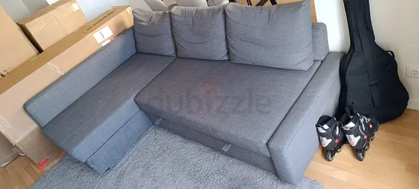 Grey L-shaped Sofa Bed with Storage - Good Condition