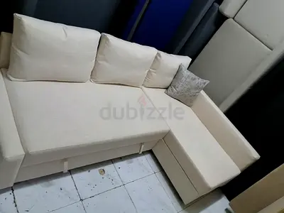 Cream L-shaped Convertible Sofa bed with Storage — Good Condition