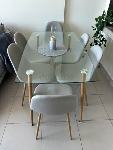 Glass Top Dining Table with 6 Grey Fabric Chairs — Great Condition