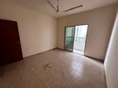 In Al Hamidiya 1, on the Mohammed Bin Zayed exit, two bedrooms, a living room with a balcony, two ba
