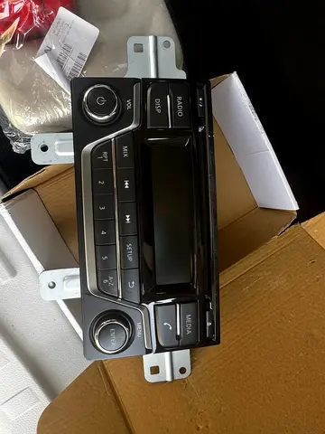 Nissan Used car stereo head unit (in-dash) with controls and display. Never used.