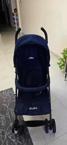 Lightweight navy baby stroller in good condition