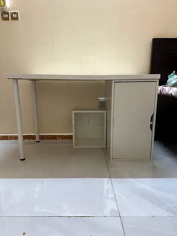 Compact white study desk with single cabinet — good condition