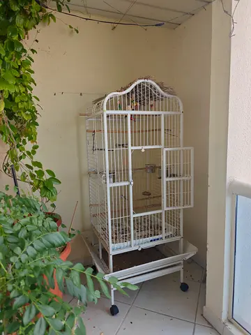 Large white metal bird cage on wheels - good condition