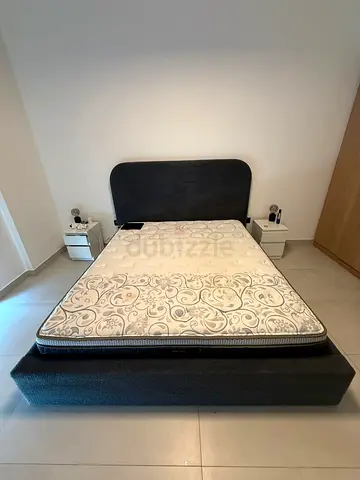 King sized bed with mattress