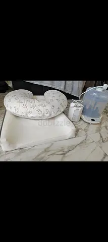 Breastfeeding/Nursing Pillow with Electric Bottle Sterilizer (used)