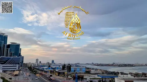 Two-bedroom apartment with a living room and a balcony offering a stunning open view of the port area.