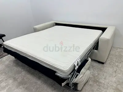 Leather three seater sofabed from Natuzzi