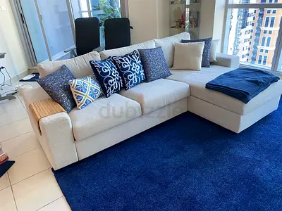 Ikea kivik L shape sofa beige Light beige L-shaped fabric sofa with chaise and cushions