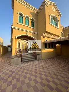 A residential-commercial villa for annual rent in Al Mowaihat – Ajman. The villa offers spacious i