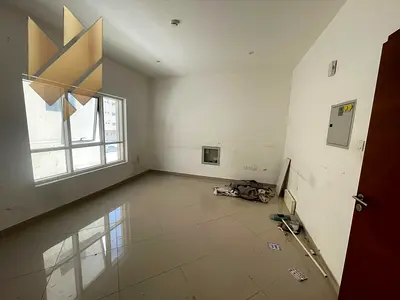 For annual rent: a one-bedroom apartment in Old Muwailih, featuring excellent finishing, spacious r