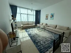 sea view. A luxurious, fully furnished two-bedroom apartment with a living room and balcony. Ajman C