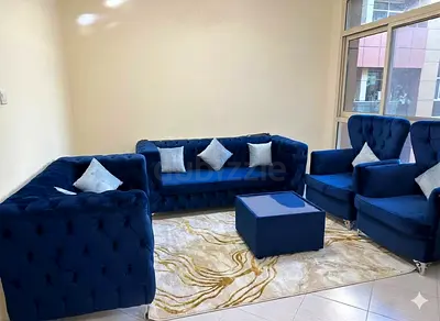 7 seater royal blue sofa, 7 dual color cushions,2 tables, all seats covers are removable  washable
