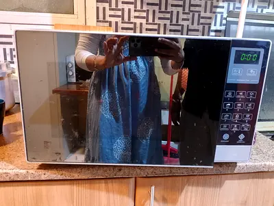 Used Mirrored Door Microwave Oven - Good Working Condition