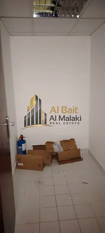Office for rent in Al Majaz 2 (Al Qasba), one month, with free air conditioning. Payments in 4-6 installments. Commercial building - offices, vibrant