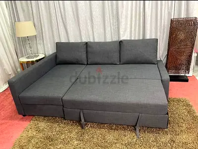 Gray L-shaped Sofa Bed with Storage - Good Condition