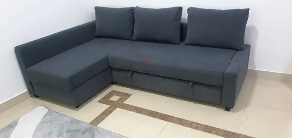 Gray colour Ikea FRIHETEN L shape sofa cum bed storage