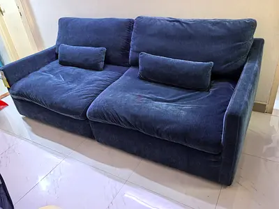 Comfortable 3-Seater Blue Velvet Sofa - Good Condition
