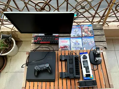 PlayStation 4 Slim bundle with monitor, controller, games and accessories