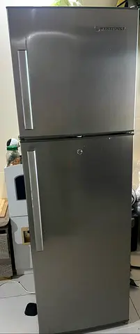Silver Top-Freezer Refrigerator - Good Working Condition. Very clean one.