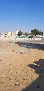 20,000 SQ.FT. COMMERCIAL PLOT WITH 65KV ELECTRICITY POWER SUPPLY FOR SALE IN AL SAJAA AREA NEAR AL S
