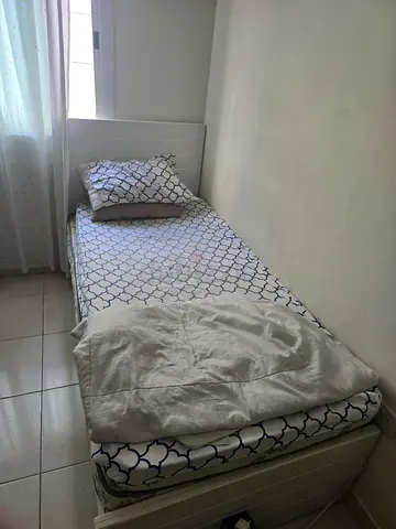 Single white wooden bed with mattress and bedding - good condition